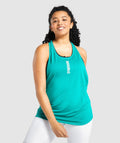 gymshark-pulse-drop-arm-tank-juniper-green