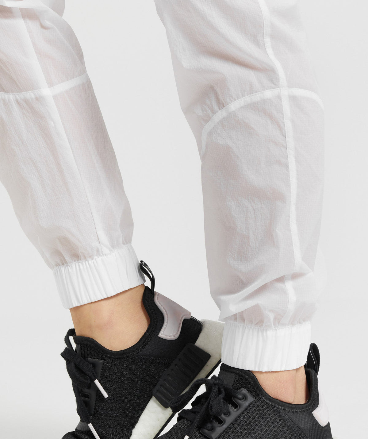 gymshark-pulse-woven-joggers-white-aw21