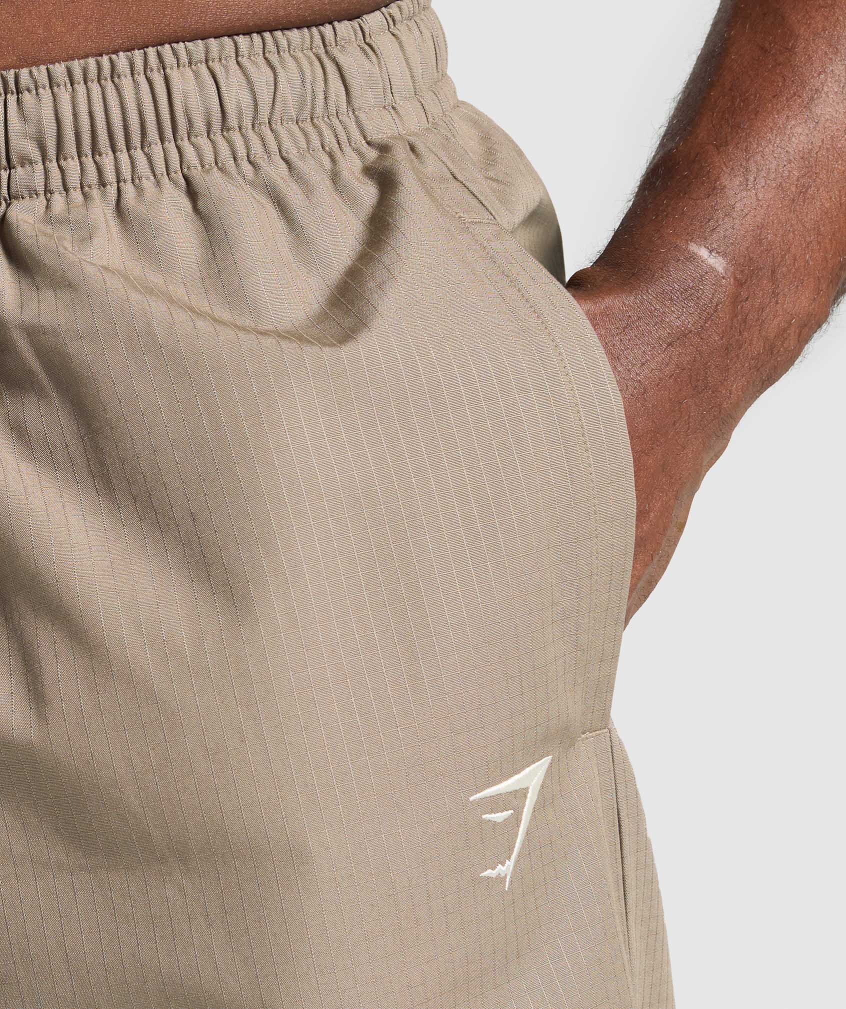 gymshark-ripstop-pumper-pants-lifestyle-brown-ss25