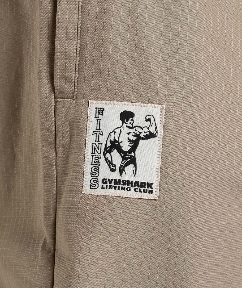 gymshark-ripstop-pumper-pants-lifestyle-brown-ss25