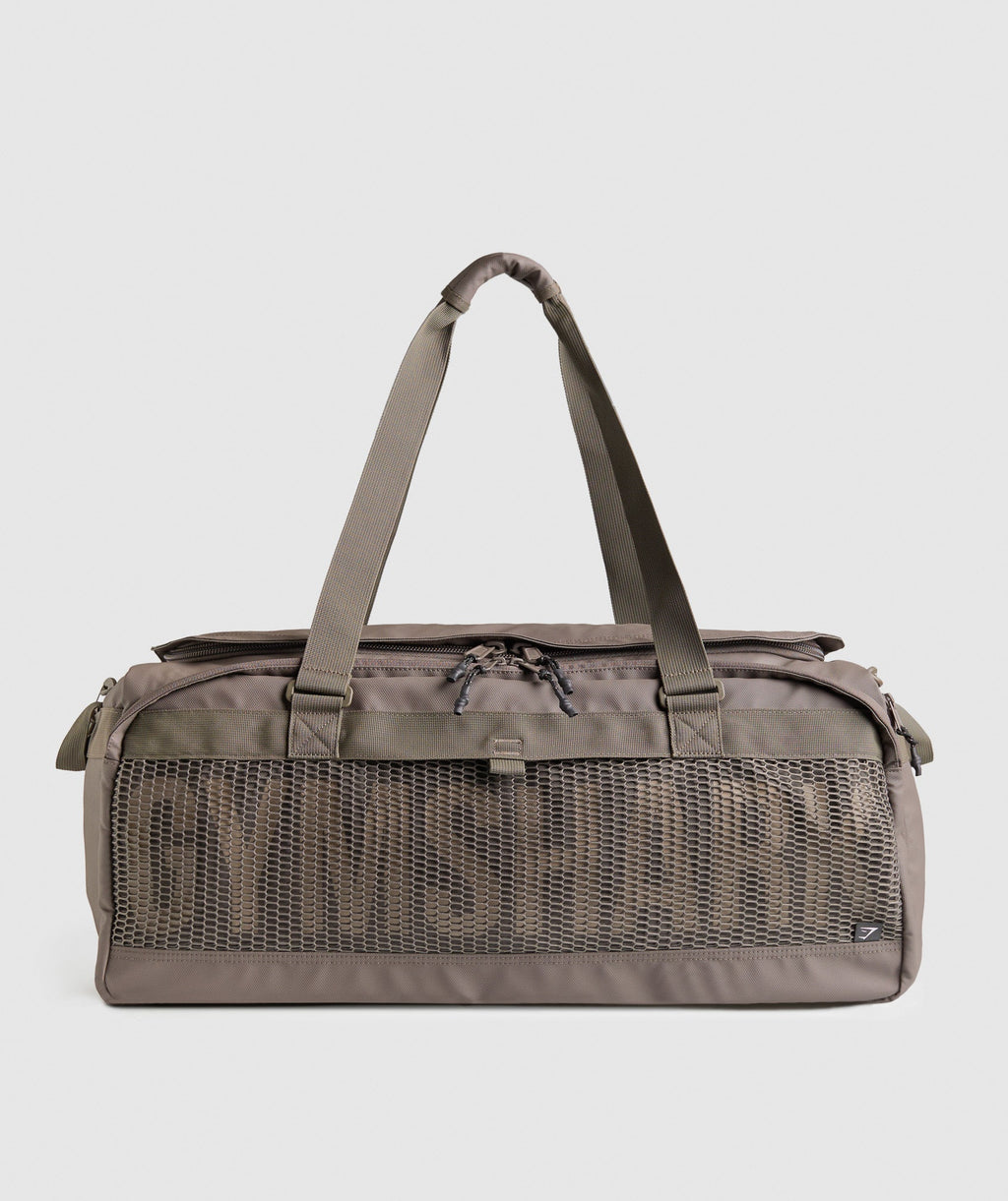 gymshark-pursuit-duffle-bag-camo-brown-cement-brown-aw24