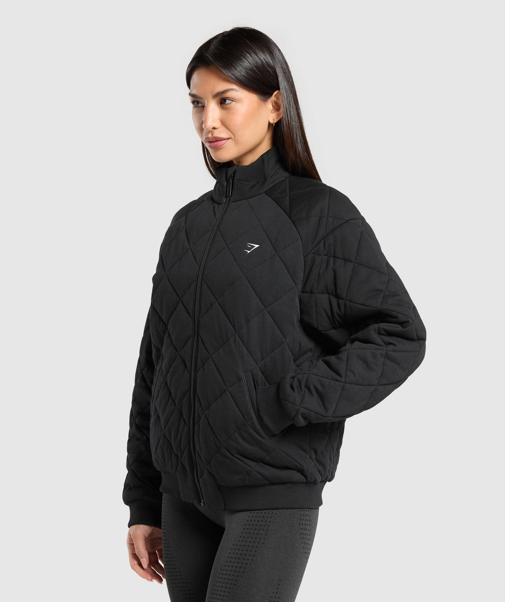 gymshark-quilted-zip-through-black-aw24