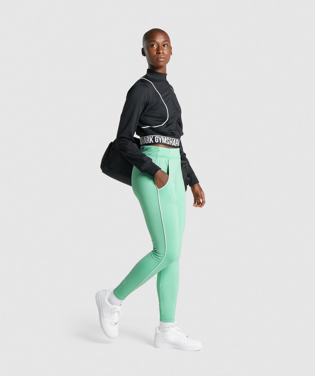gymshark-recess-joggers-light-green-white-logo