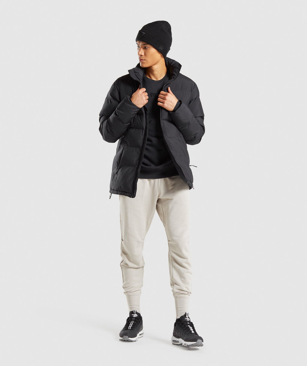 gymshark-restore-puffer-jacket-black