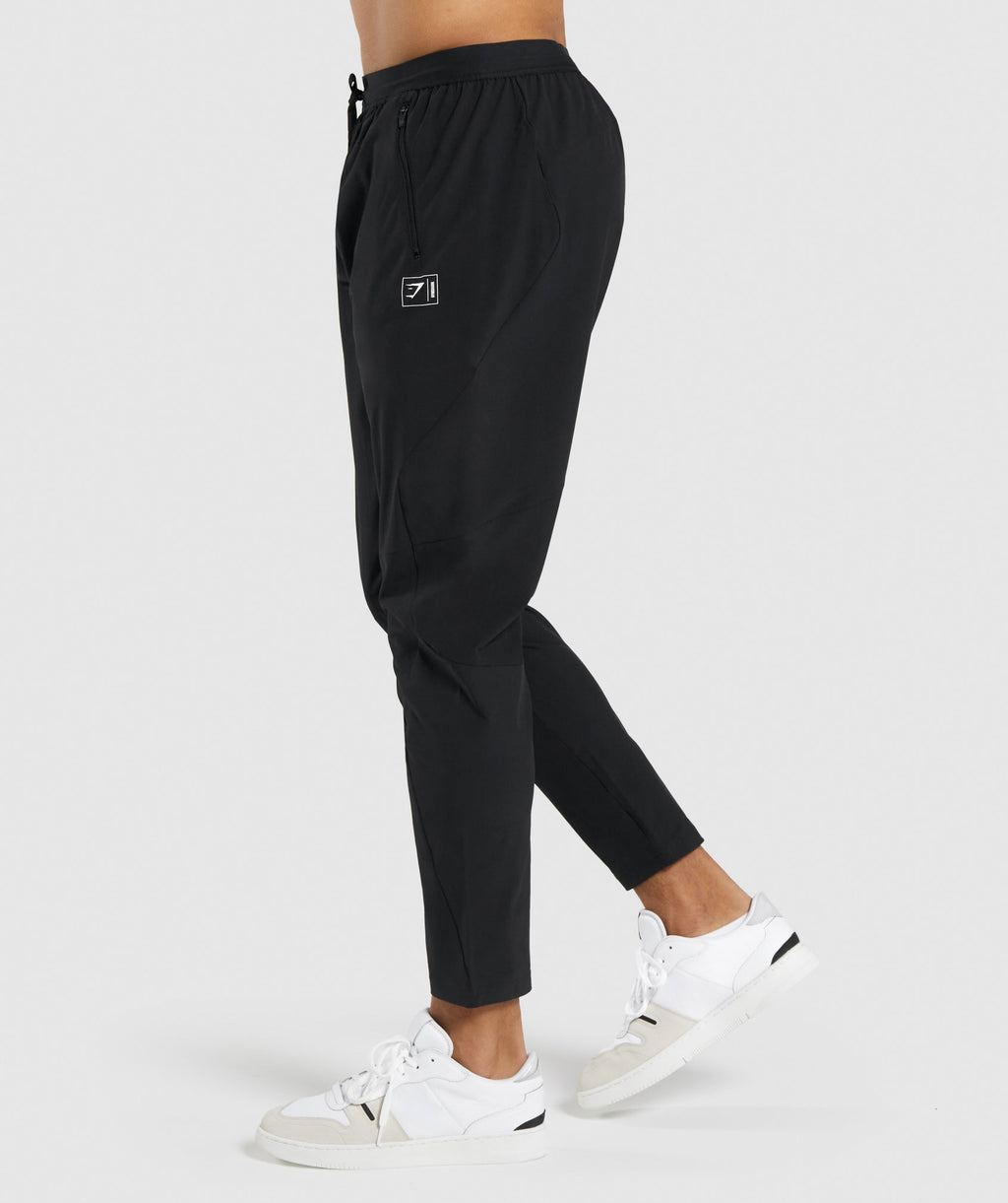 gymshark-retake-woven-joggers-black