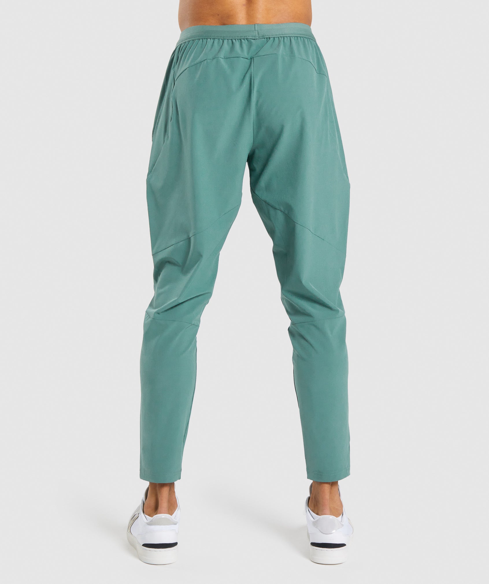 gymshark-retake-woven-joggers-dark-green