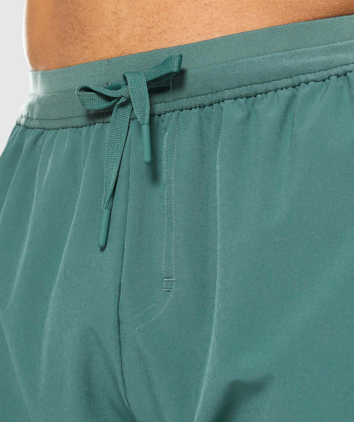 gymshark-retake-woven-joggers-dark-green