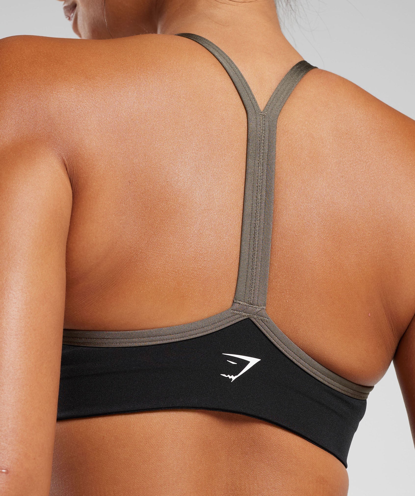 gymshark-retro-club-sports-bra-black-camo-brown-aw23