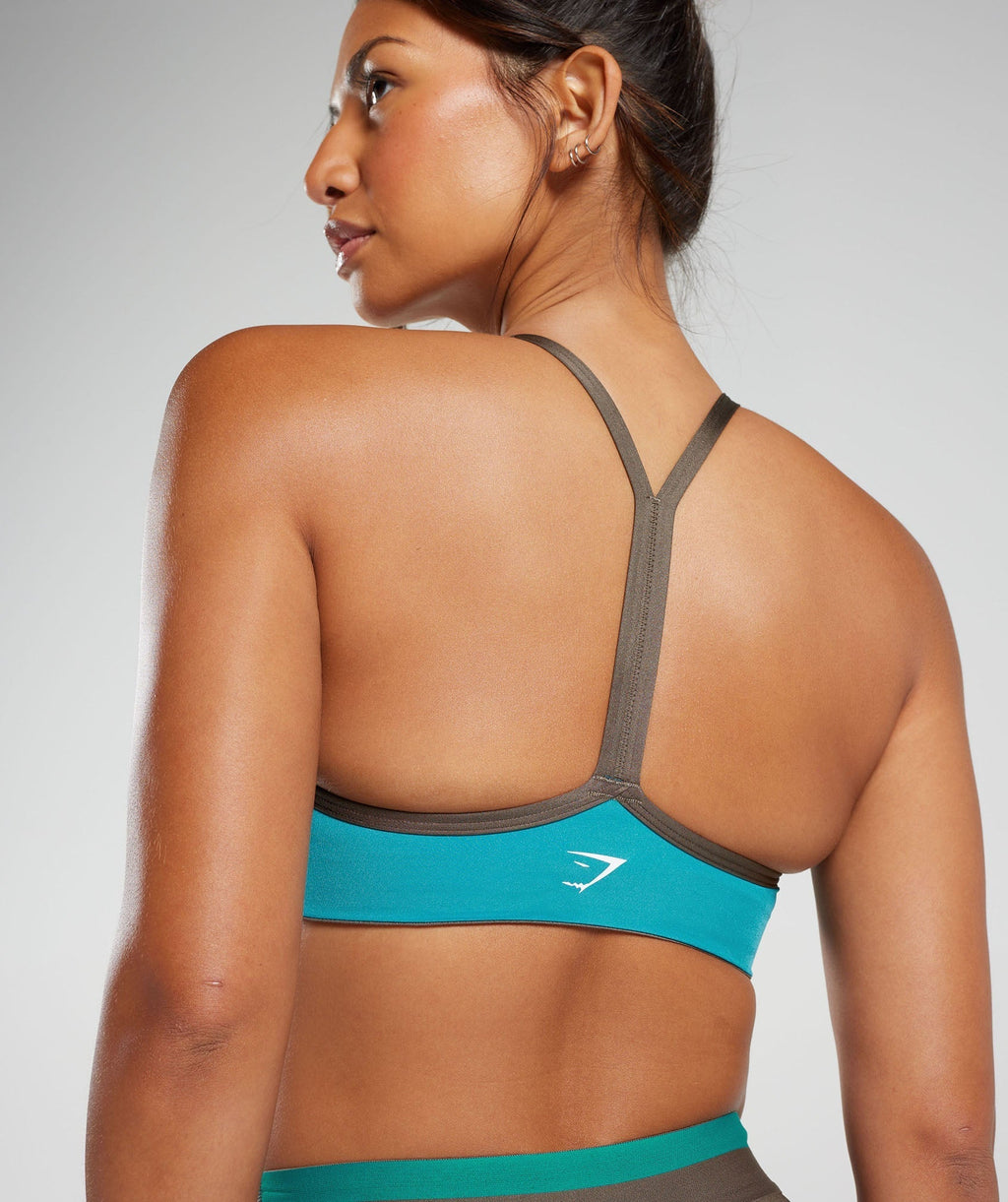 gymshark-retro-club-sports-bra-camo-brown-seafoam-blue-aw23