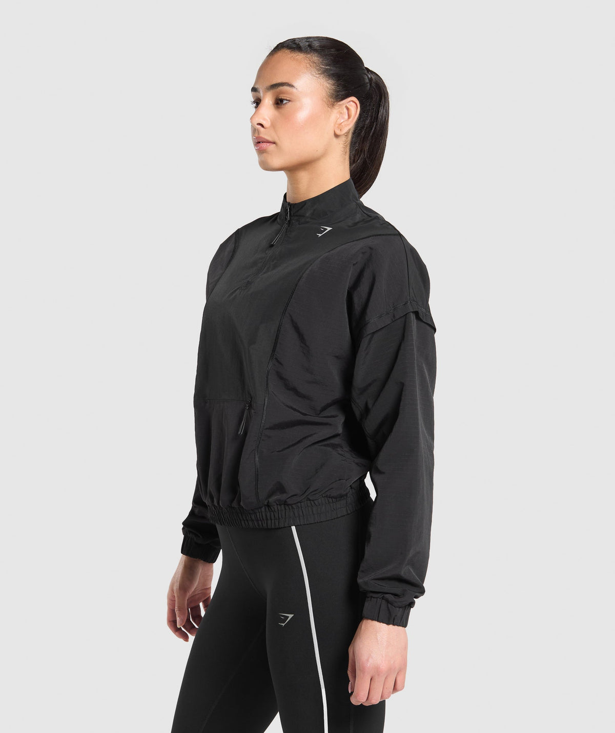 gymshark-running-1-4-zip-track-top-black-aw24