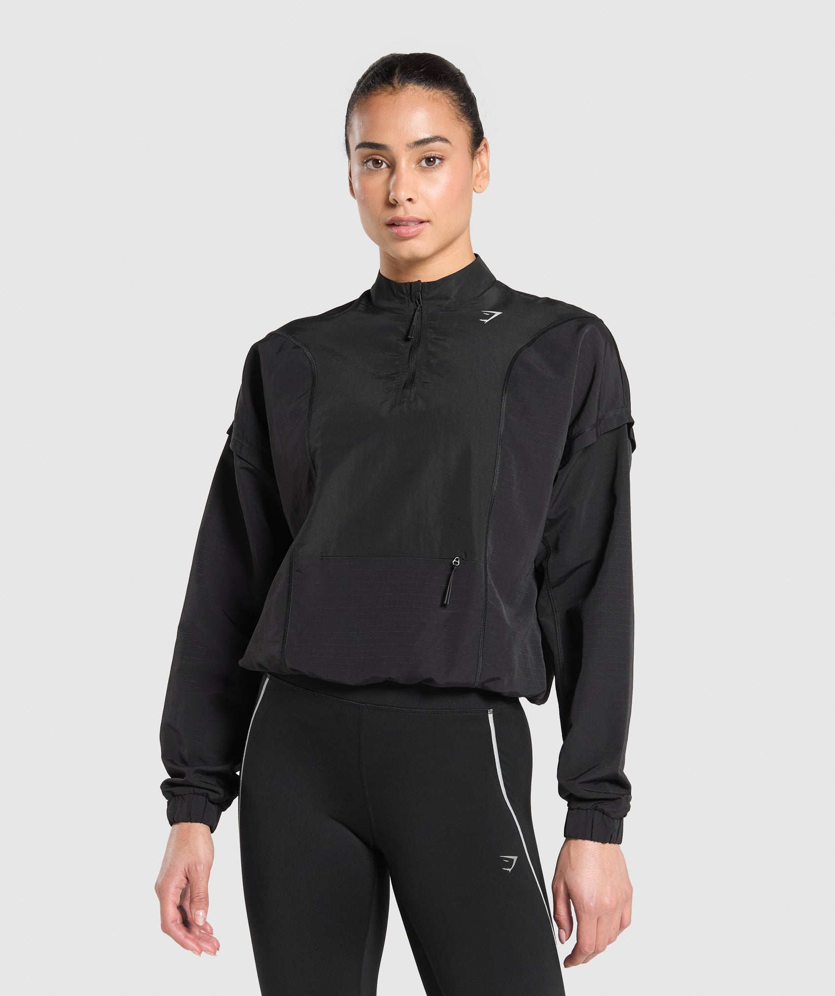 gymshark-running-1-4-zip-track-top-black-aw24