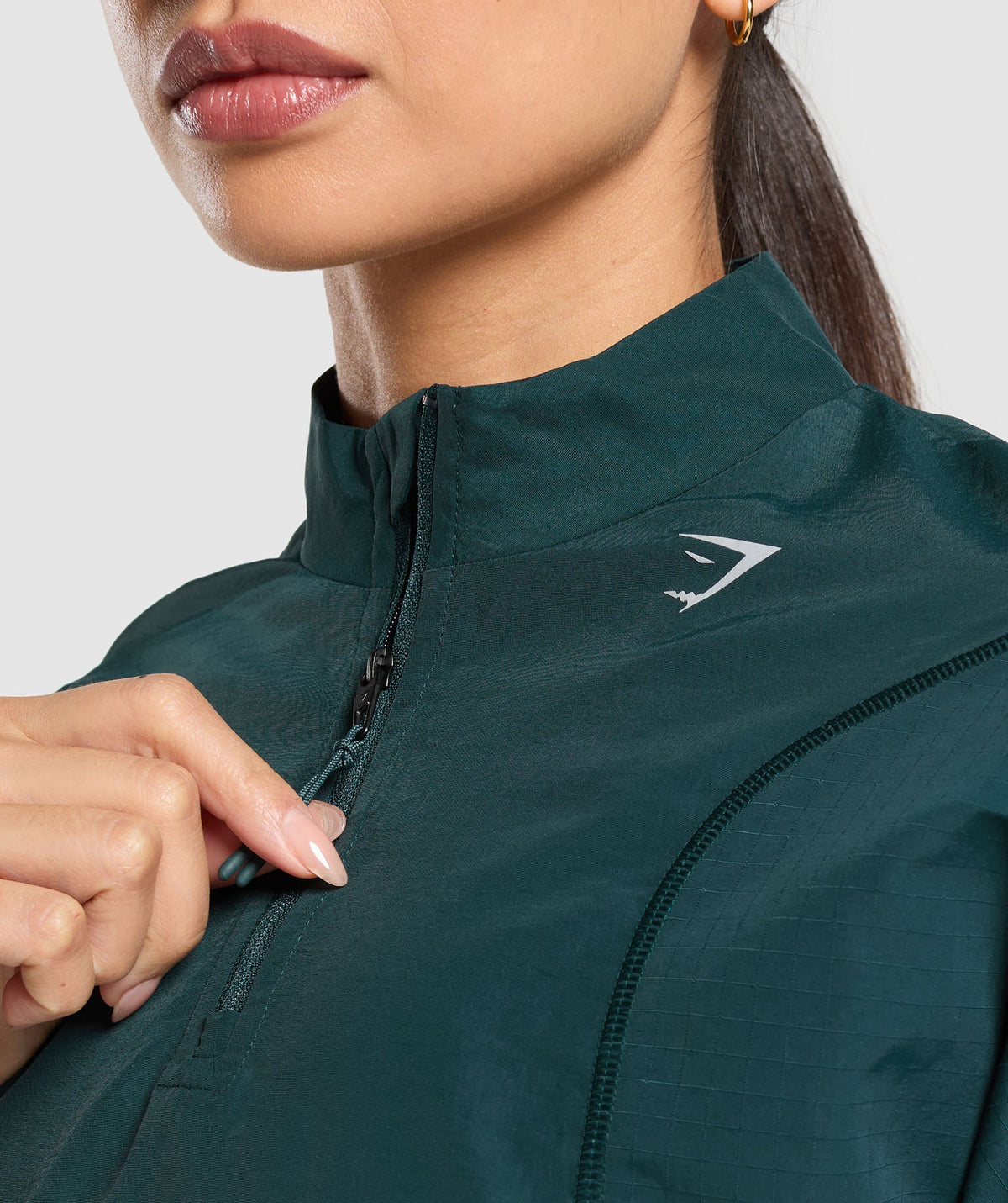 gymshark-running-1-4-zip-track-top-strong-teal-aw24