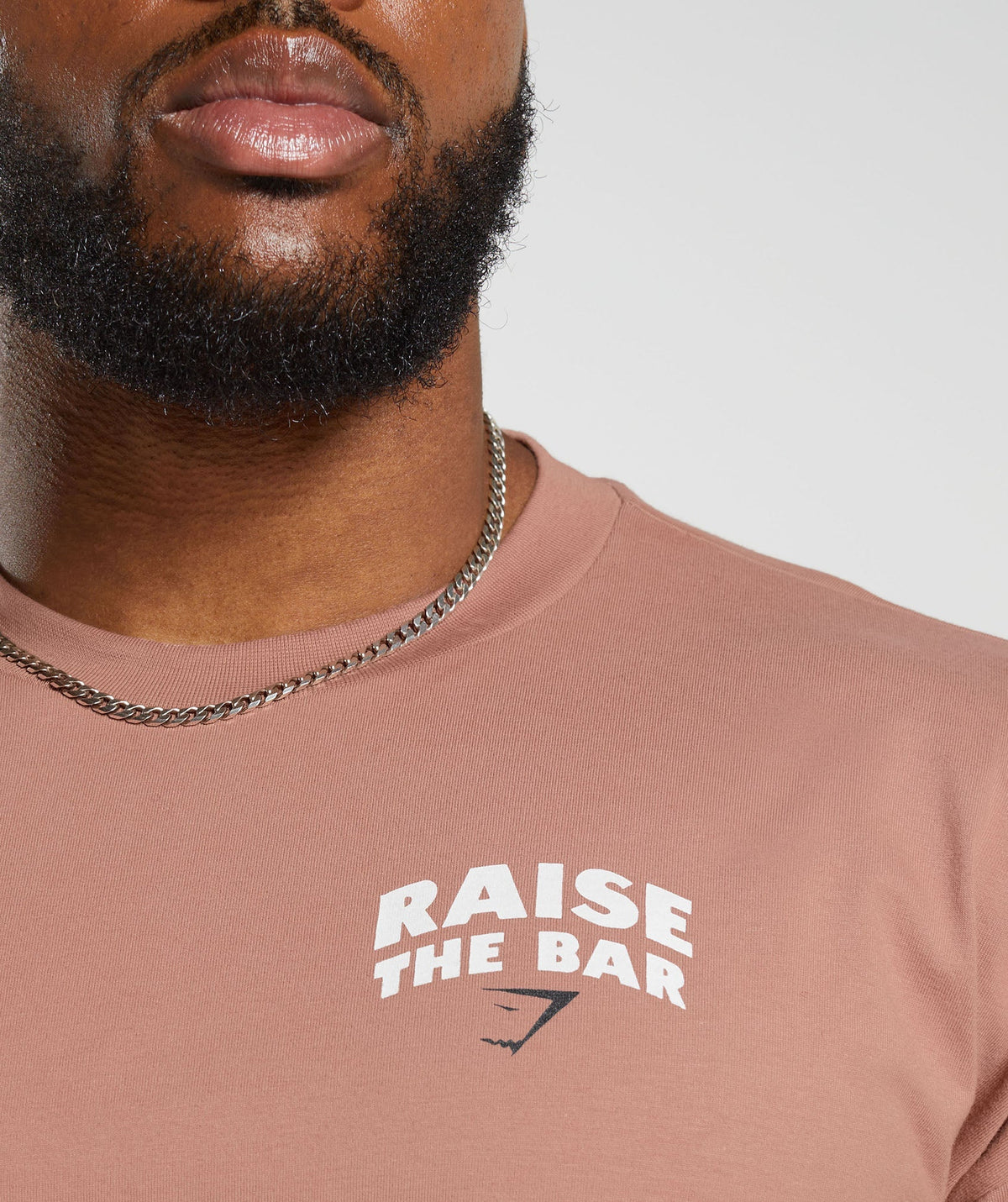 gymshark-raise-the-bar-t-shirt-faded-pink-aw23