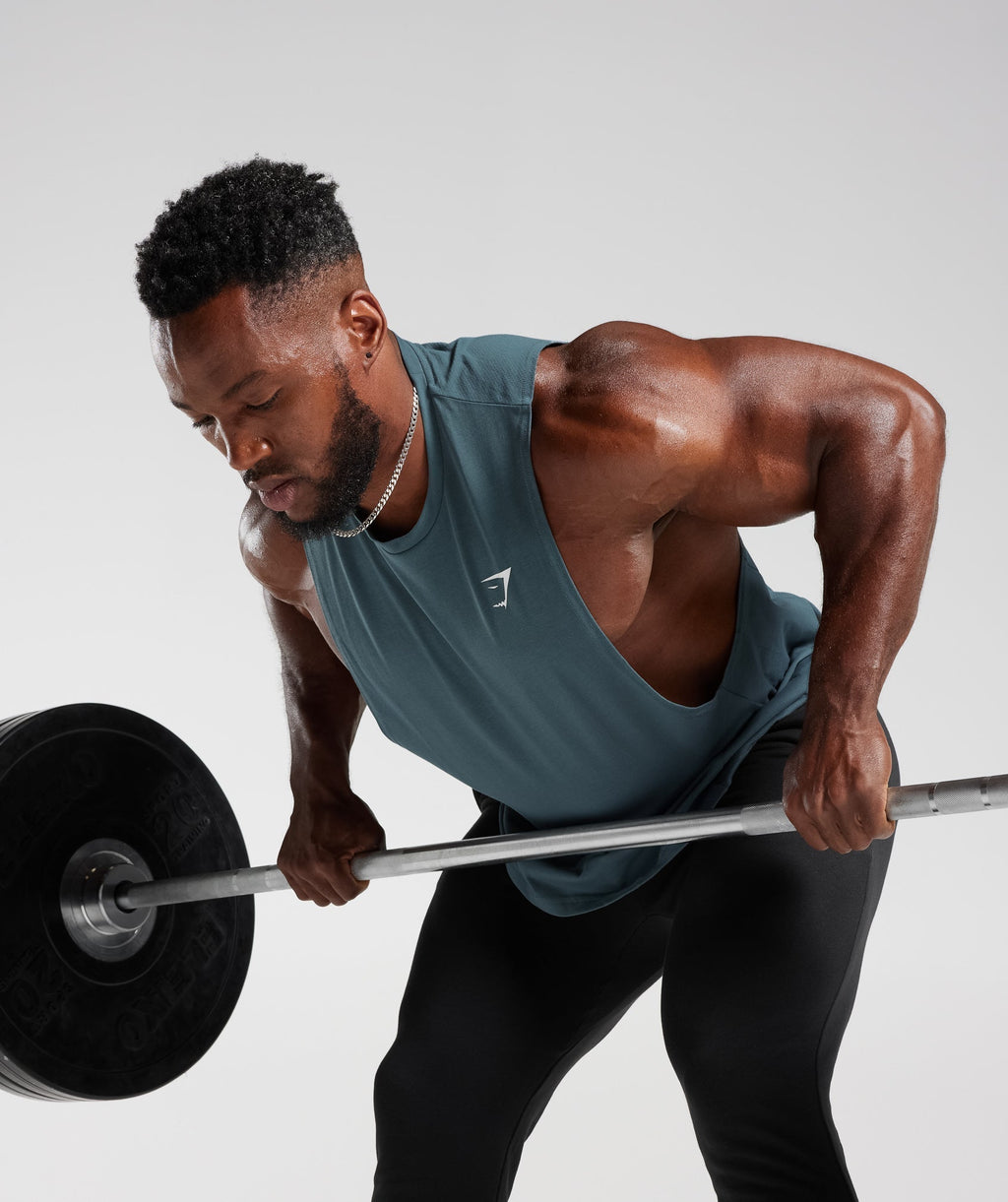 gymshark-react-drop-arm-tank-denim-teal-aw23