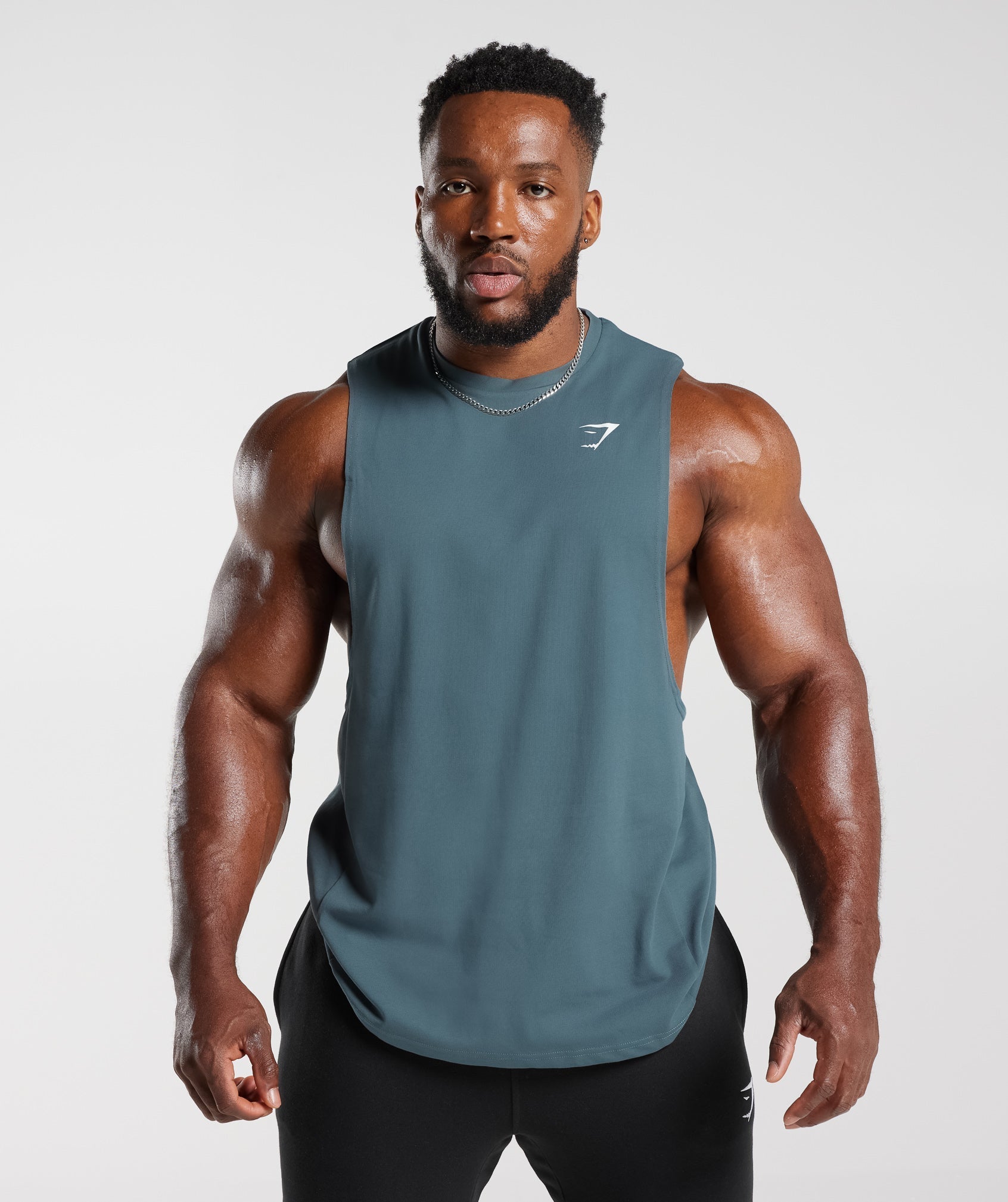 gymshark-react-drop-arm-tank-denim-teal-aw23