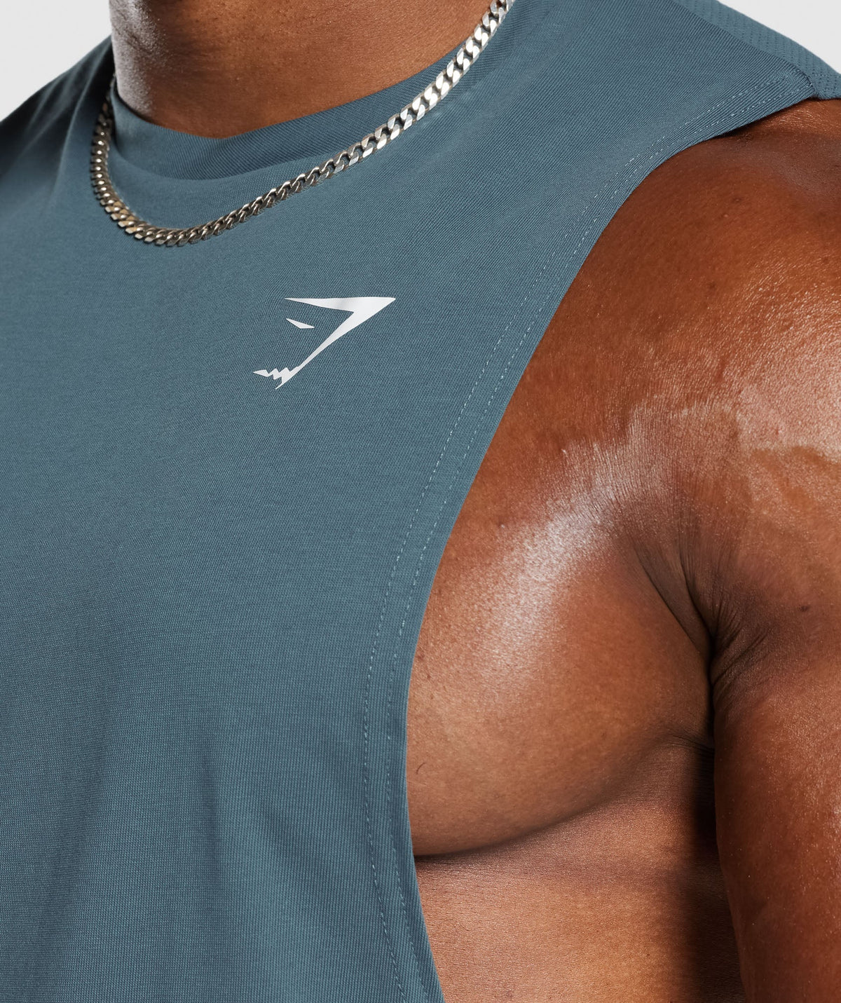 gymshark-react-drop-arm-tank-denim-teal-aw23