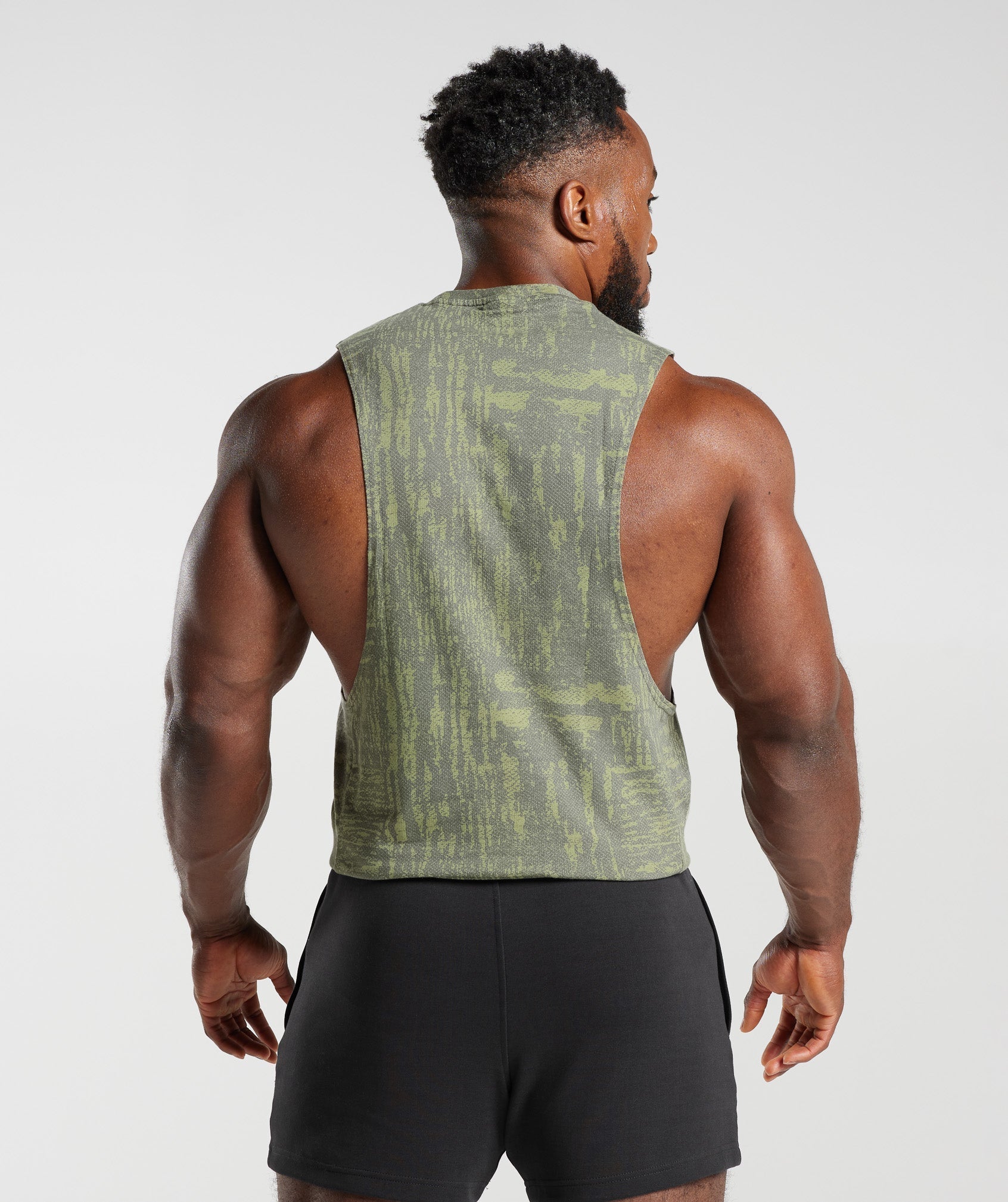 gymshark-react-drop-arm-tank-dusk-green-aw23