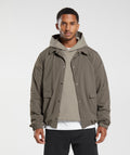 gymshark-rest-day-commute-jacket-camo-brown-aw23