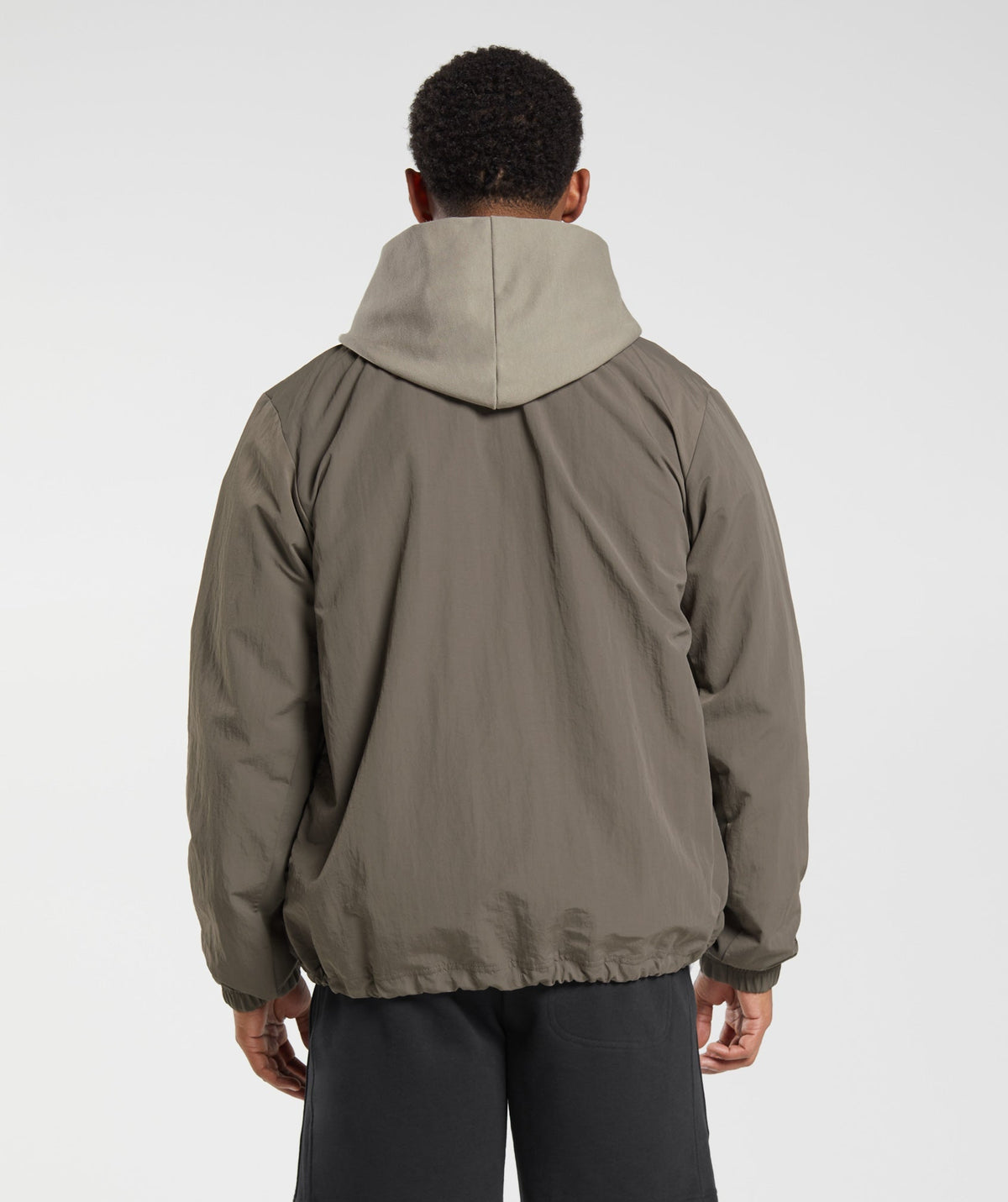 gymshark-rest-day-commute-jacket-camo-brown-aw23