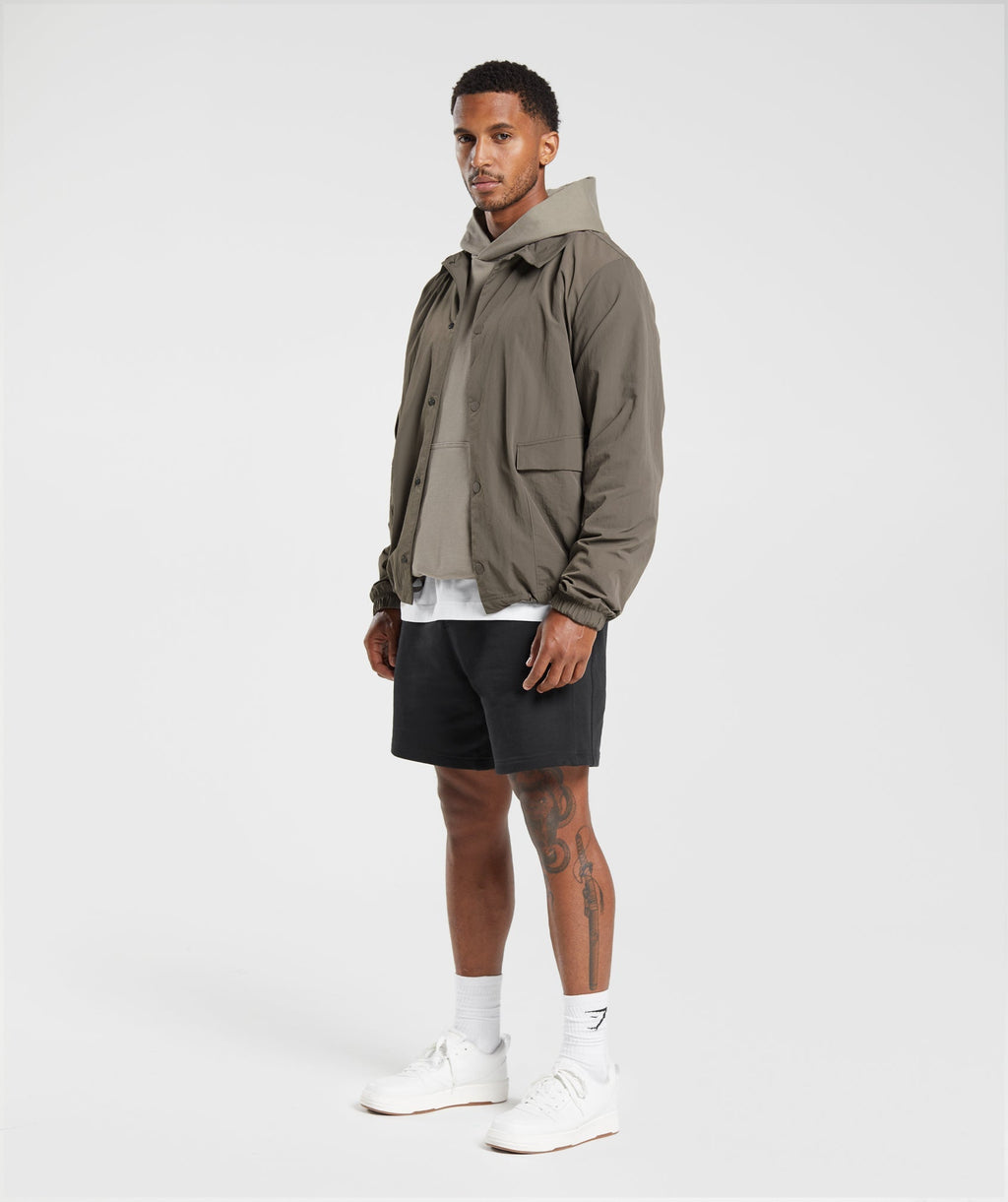 gymshark-rest-day-commute-jacket-camo-brown-aw23