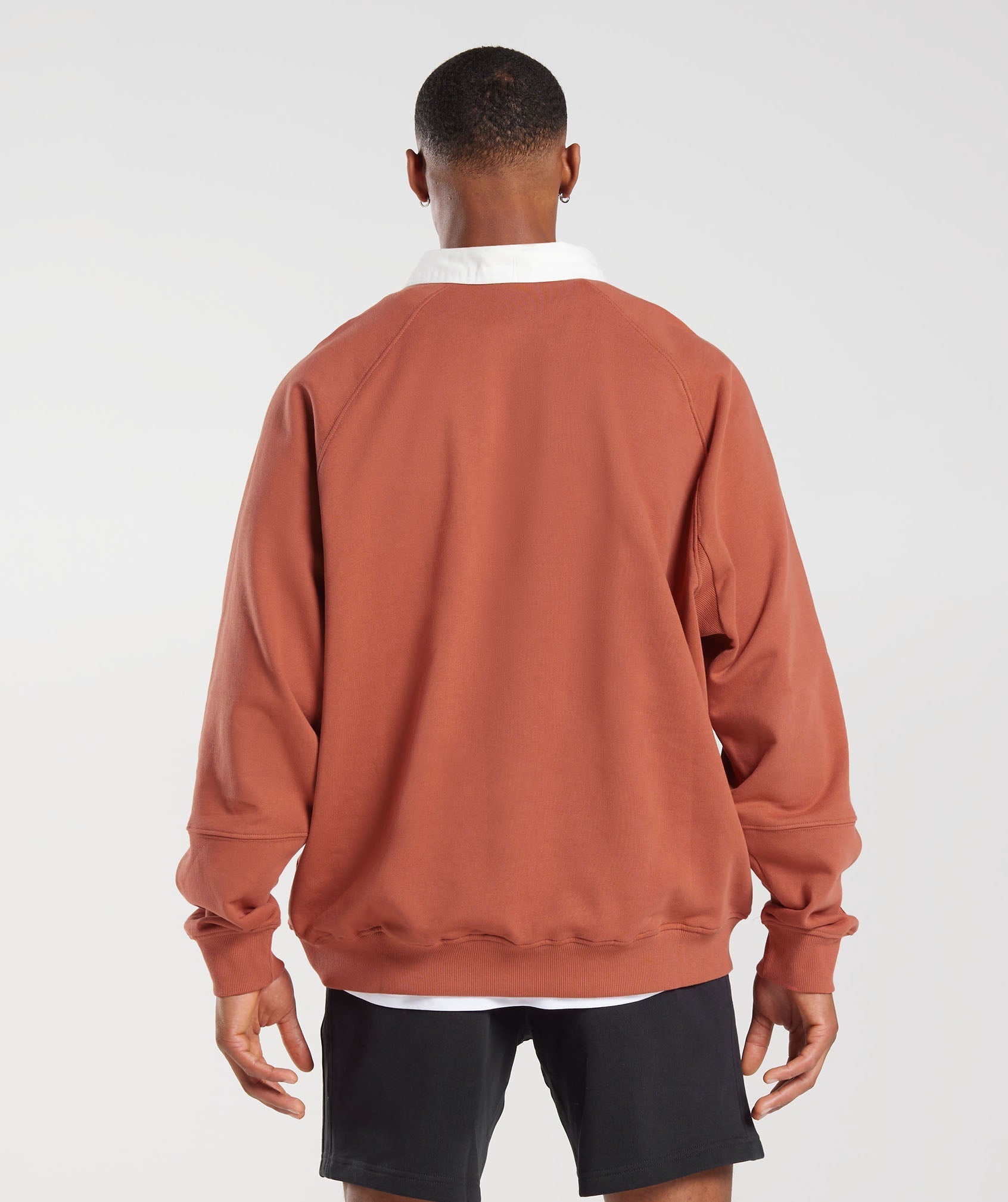 gymshark-rest-day-essentials-sweat-polo-persimmon-red-ss23