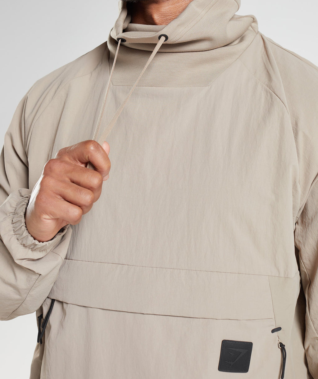 gymshark-retake-anorak-cement-brown-aw22