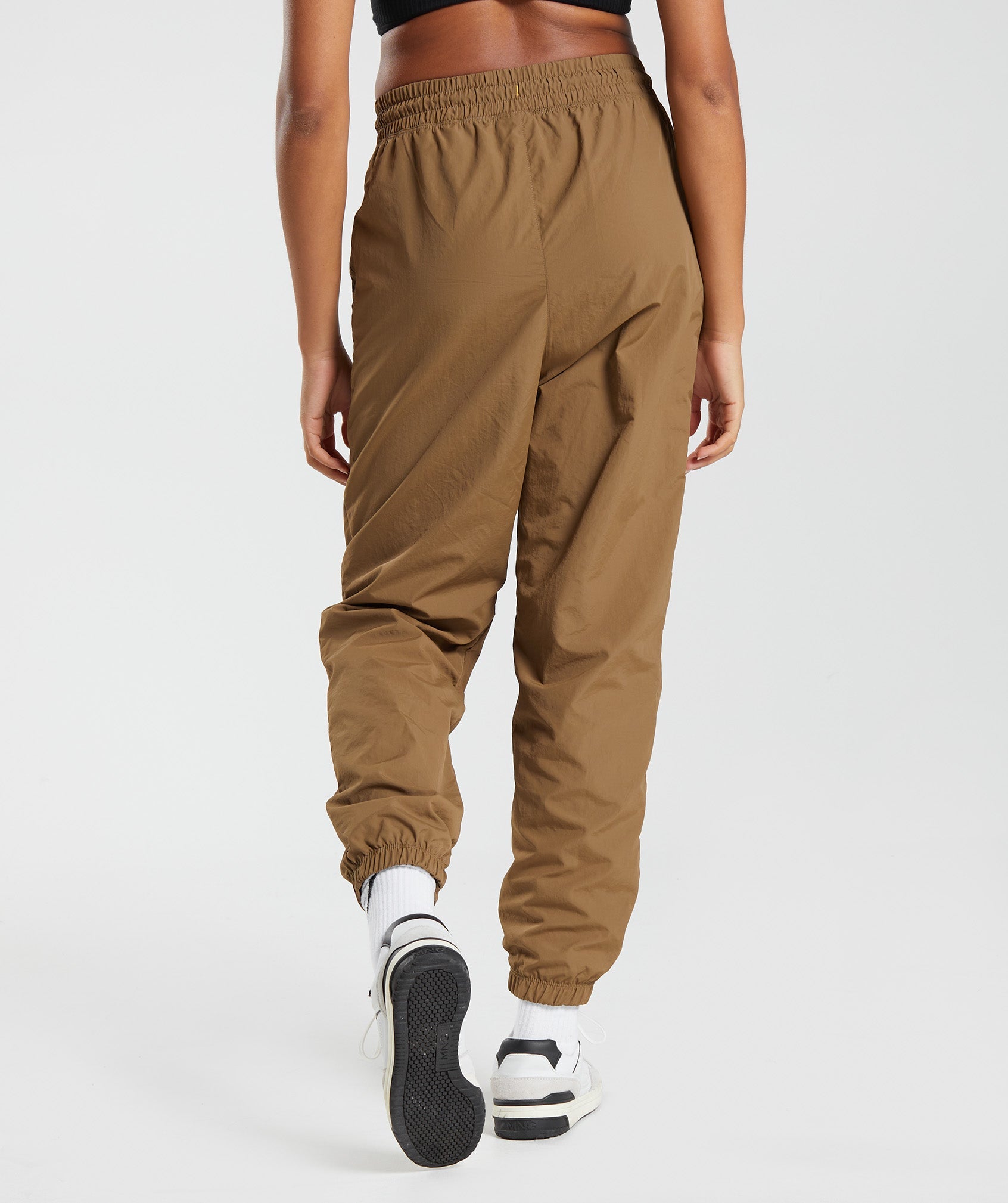 gymshark-retake-track-joggers-puddle-brown-aw22