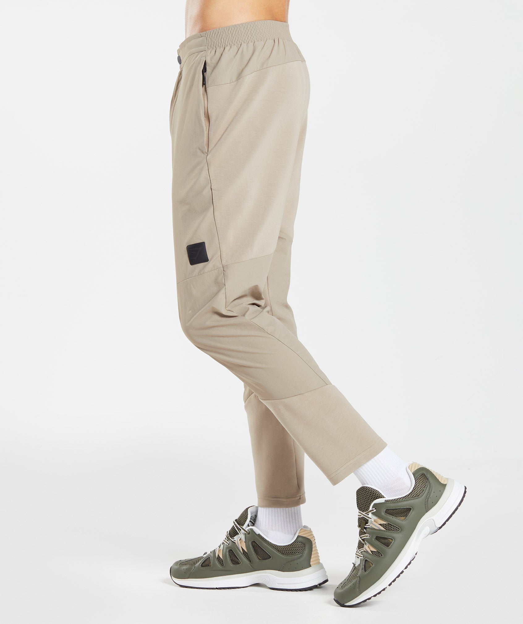 gymshark-retake-woven-joggers-cement-brown-aw22