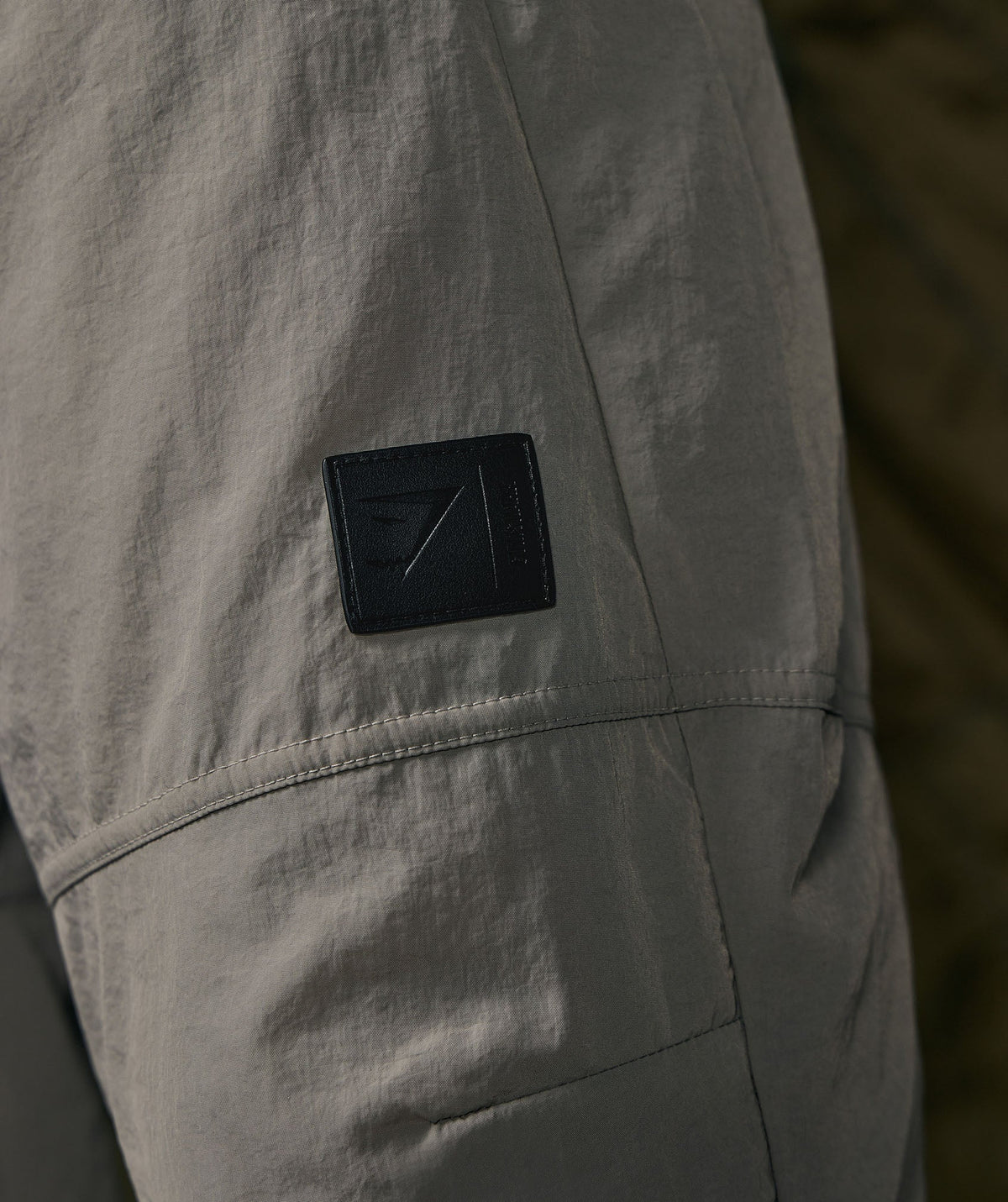gymshark-retake-woven-joggers-taupe-grey-ss22