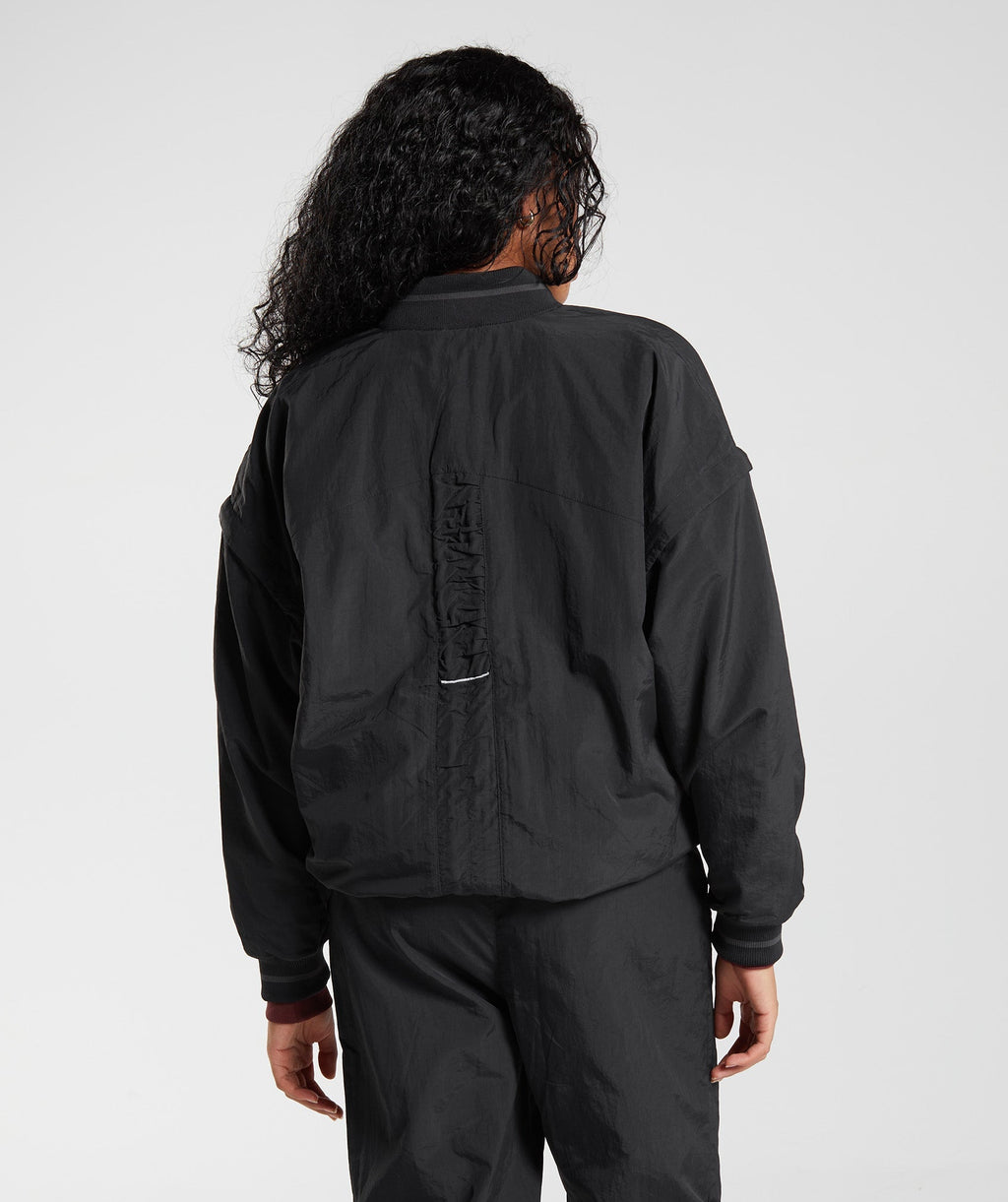 gymshark-retake-woven-jacket-black-aw22