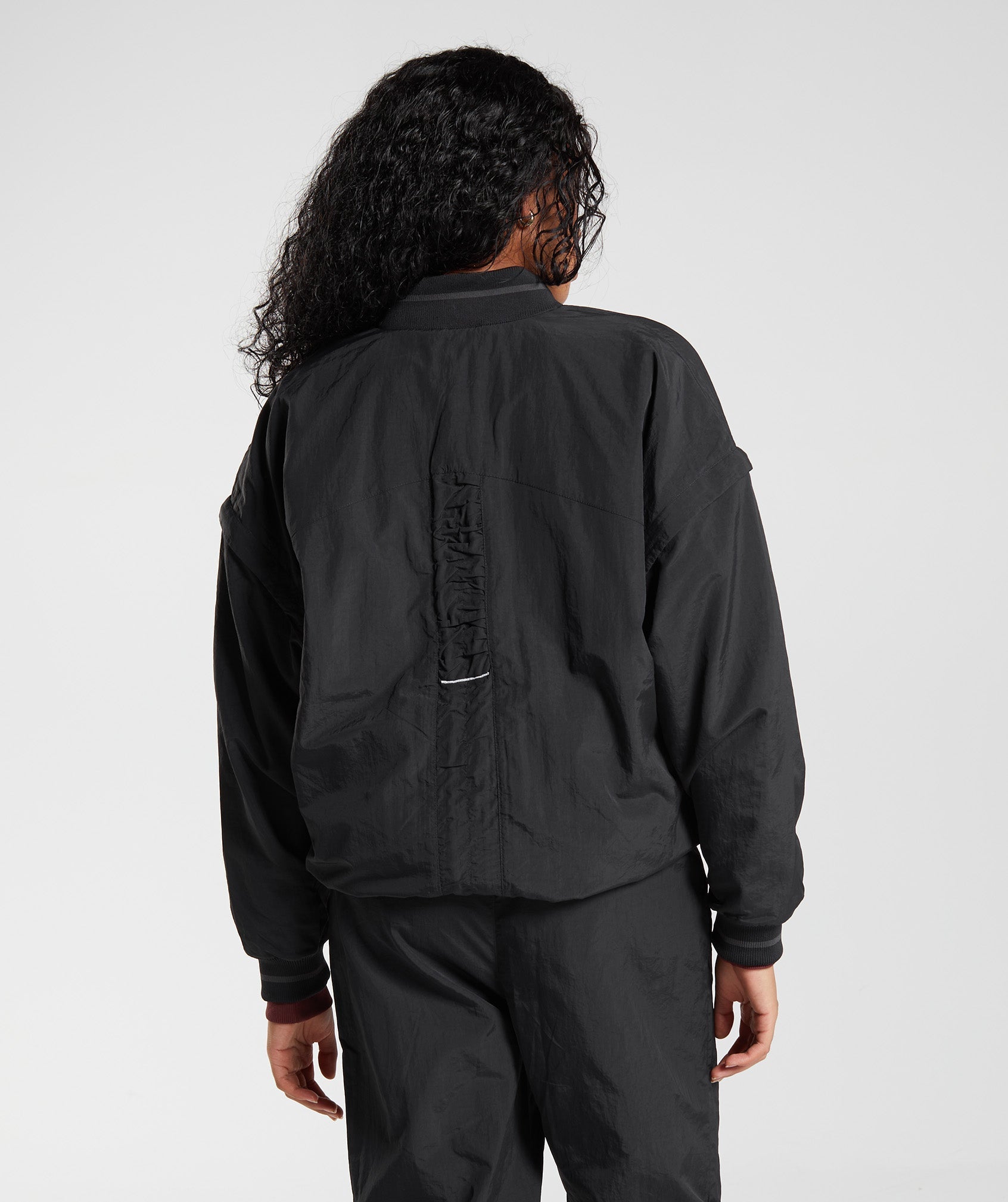gymshark-retake-woven-jacket-black-aw22