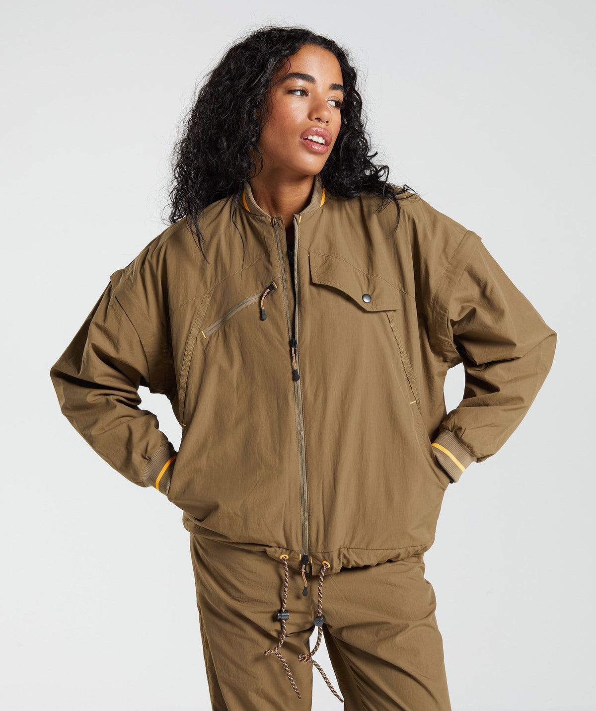 gymshark-retake-woven-jacket-puddle-brown-aw22