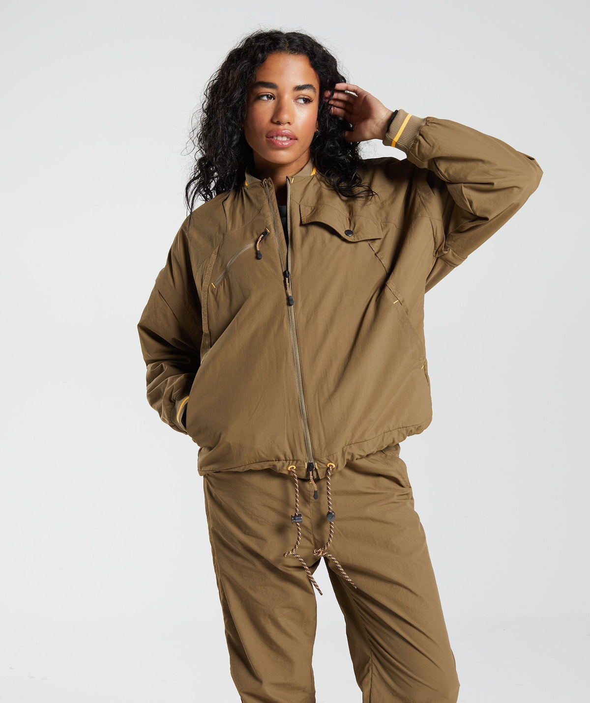 gymshark-retake-woven-jacket-puddle-brown-aw22