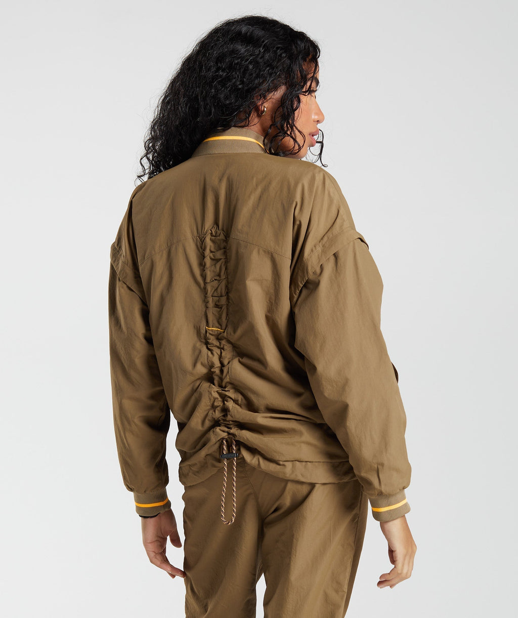 gymshark-retake-woven-jacket-puddle-brown-aw22