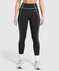 gymshark-retro-contrast-stitch-leggings-black-light-grey-ss25