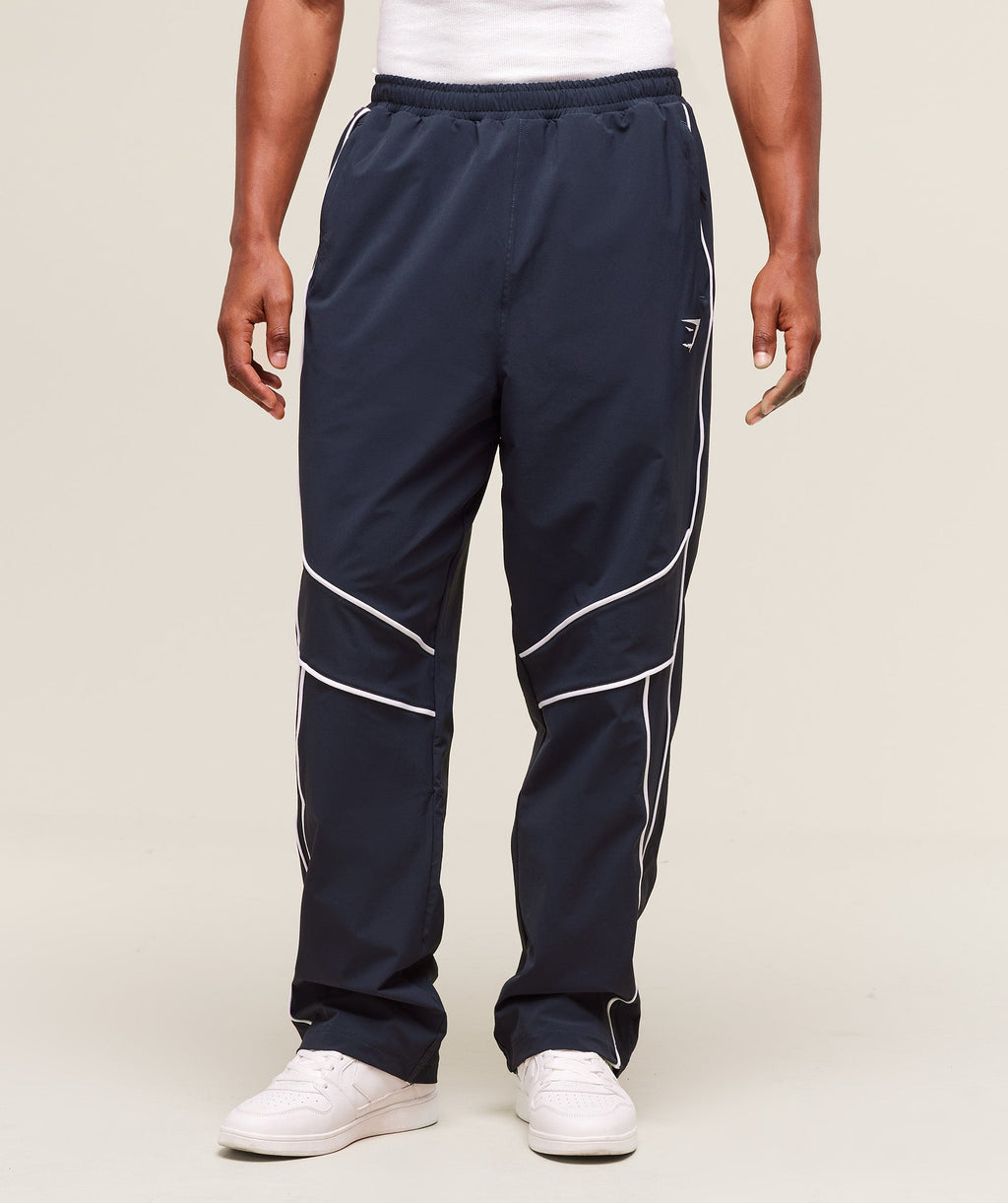 gymshark-retro-crinkle-track-pants-heavy-blue-ss25