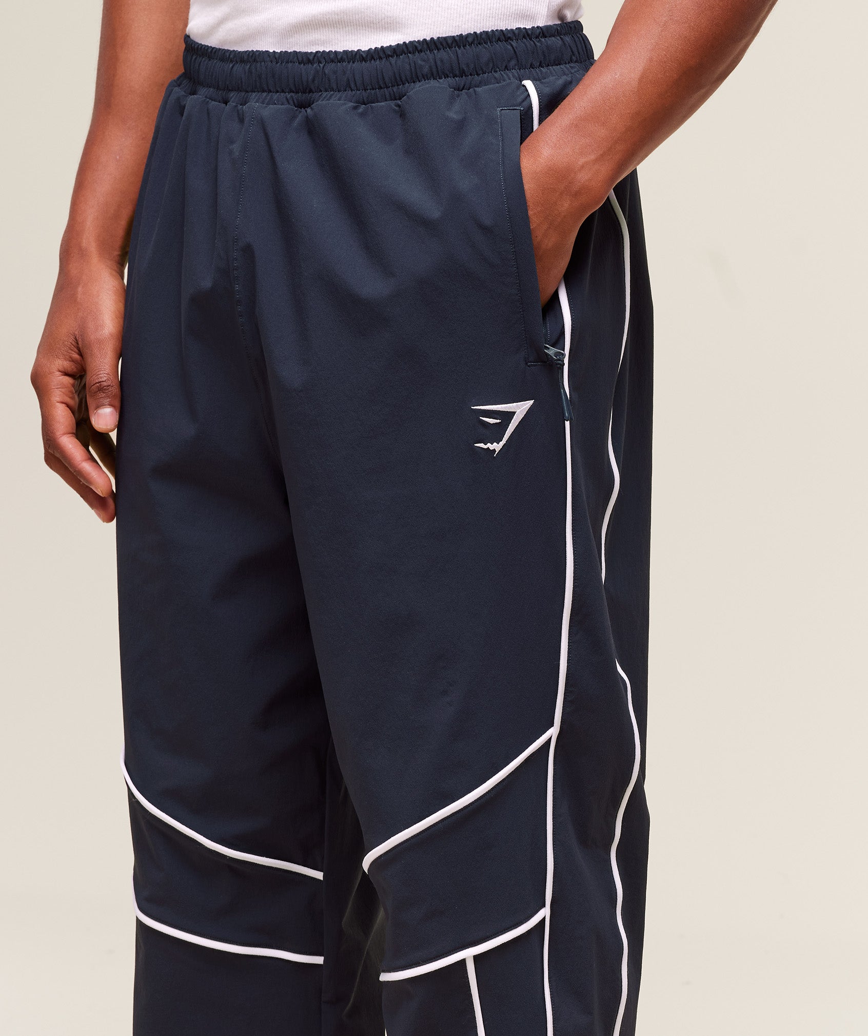 gymshark-retro-crinkle-track-pants-heavy-blue-ss25