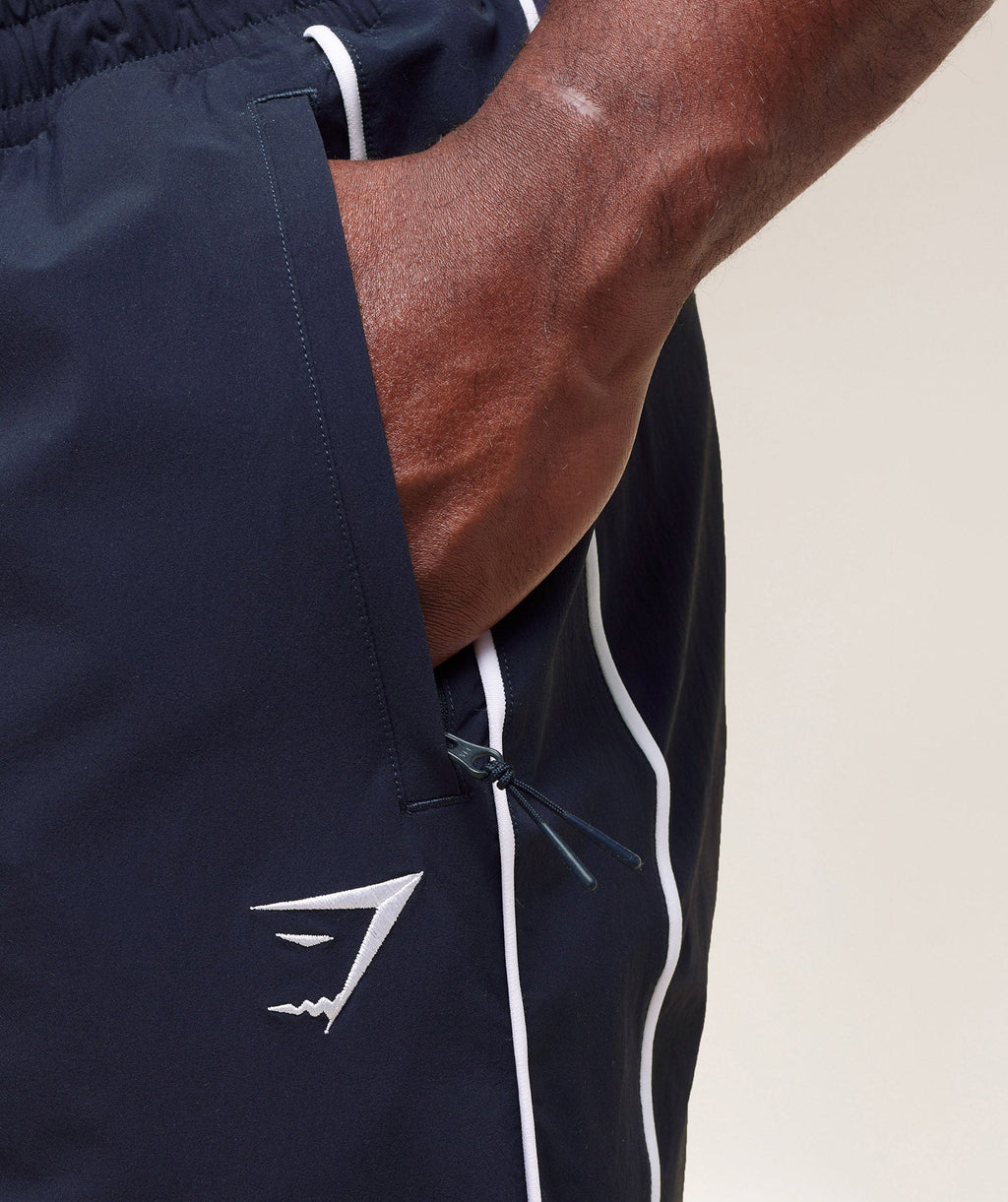 gymshark-retro-crinkle-track-pants-heavy-blue-ss25