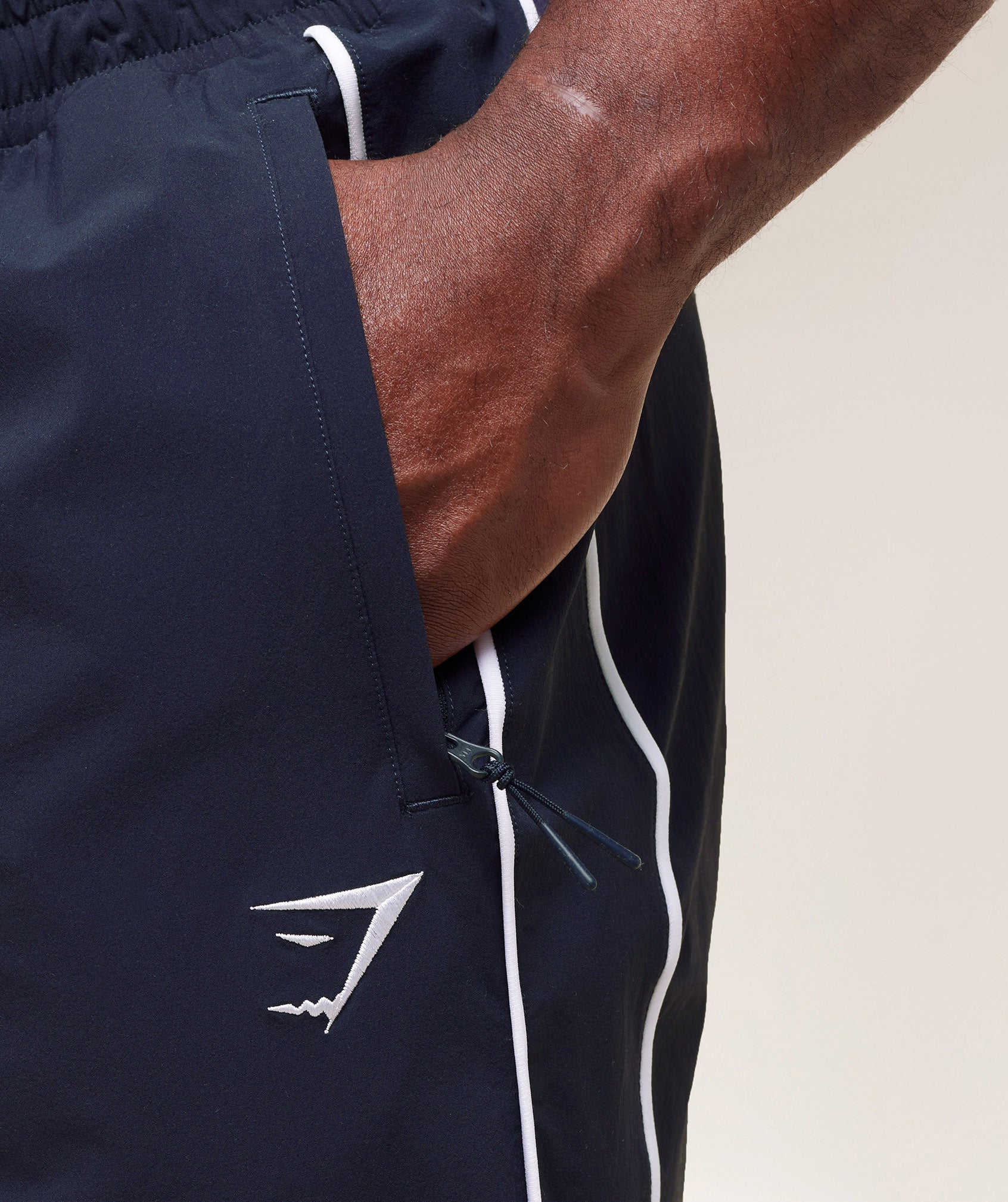gymshark-retro-crinkle-track-pants-heavy-blue-ss25