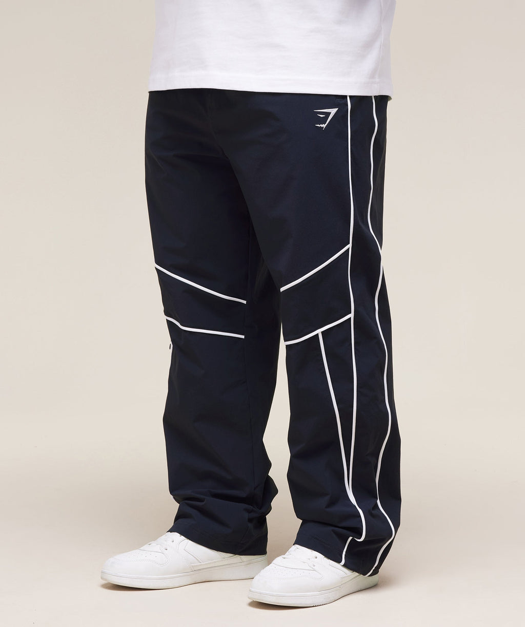gymshark-retro-crinkle-track-pants-heavy-blue-ss25