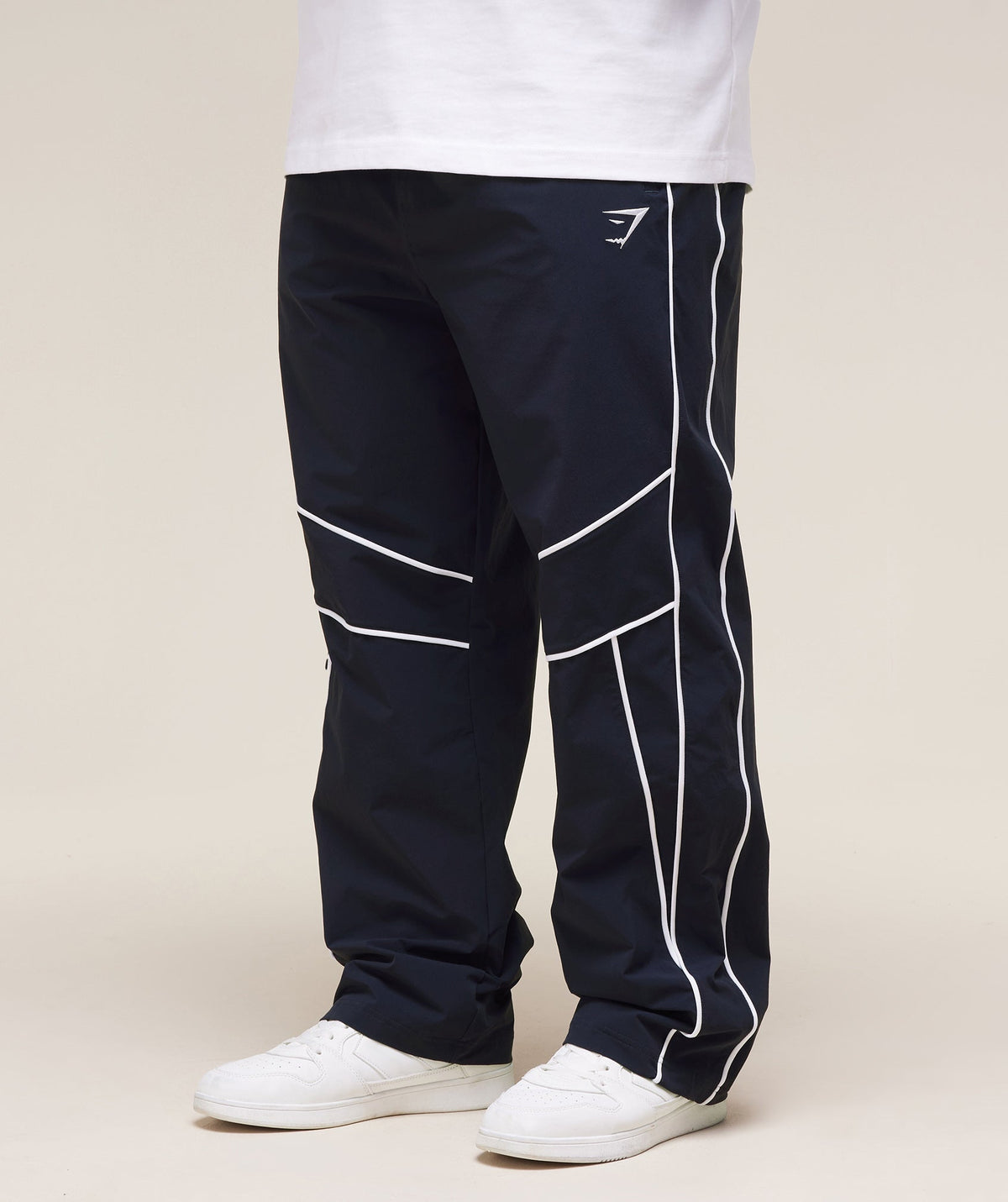 gymshark-retro-crinkle-track-pants-heavy-blue-ss25