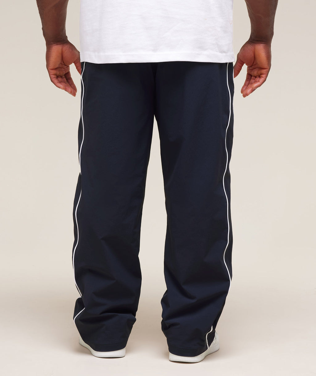 gymshark-retro-crinkle-track-pants-heavy-blue-ss25