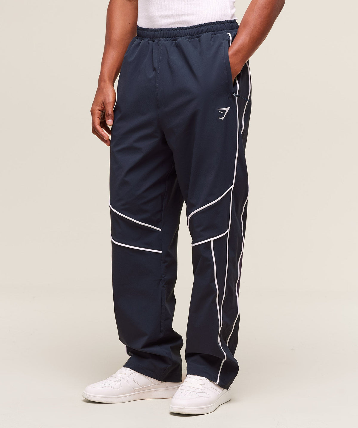 gymshark-retro-crinkle-track-pants-heavy-blue-ss25