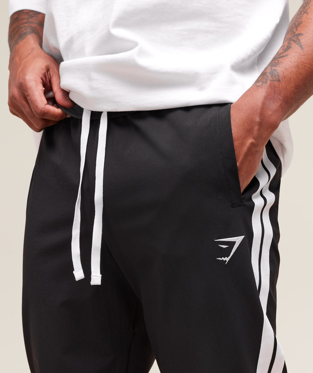 gymshark-retro-side-stripe-joggers-pants-black-ss25