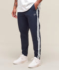 gymshark-retro-side-stripe-joggers-heavy-blue-ss25