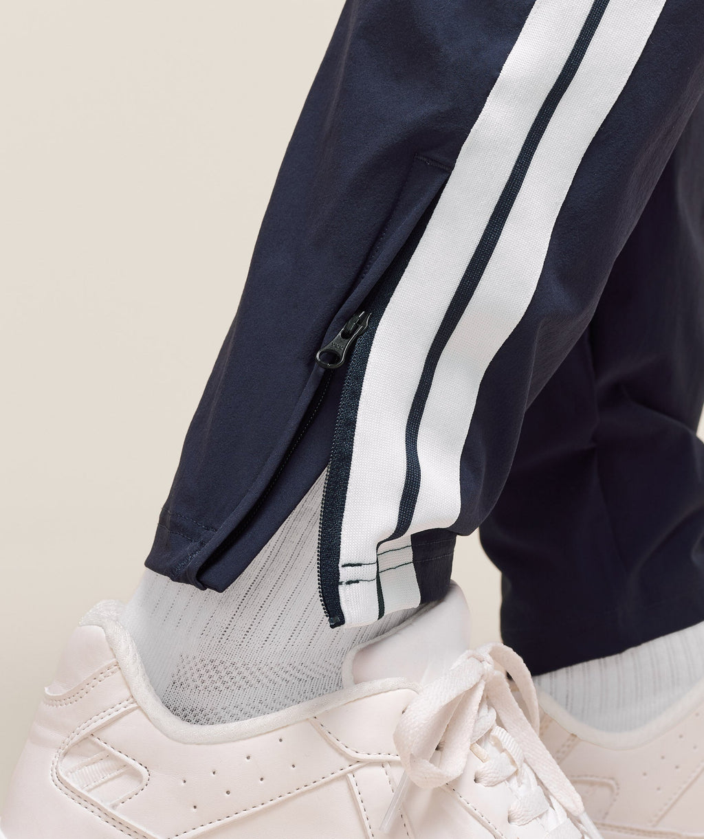 gymshark-retro-side-stripe-joggers-heavy-blue-ss25