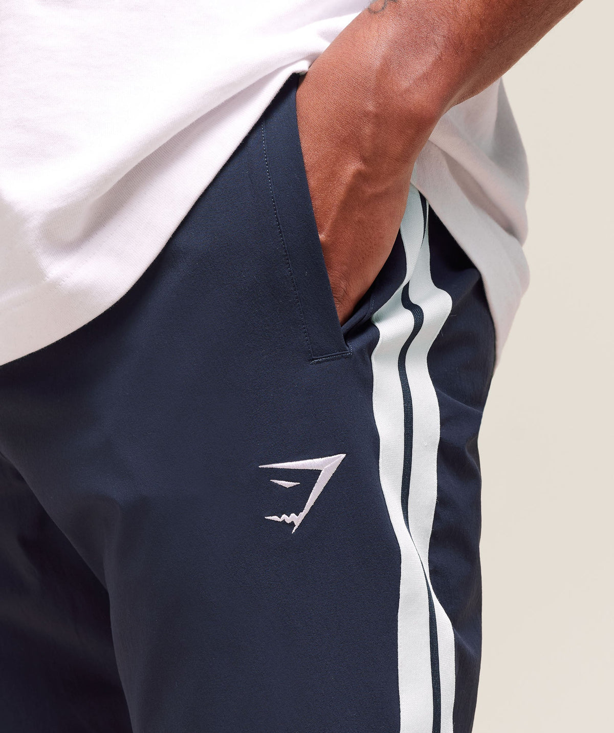 gymshark-retro-side-stripe-joggers-heavy-blue-ss25