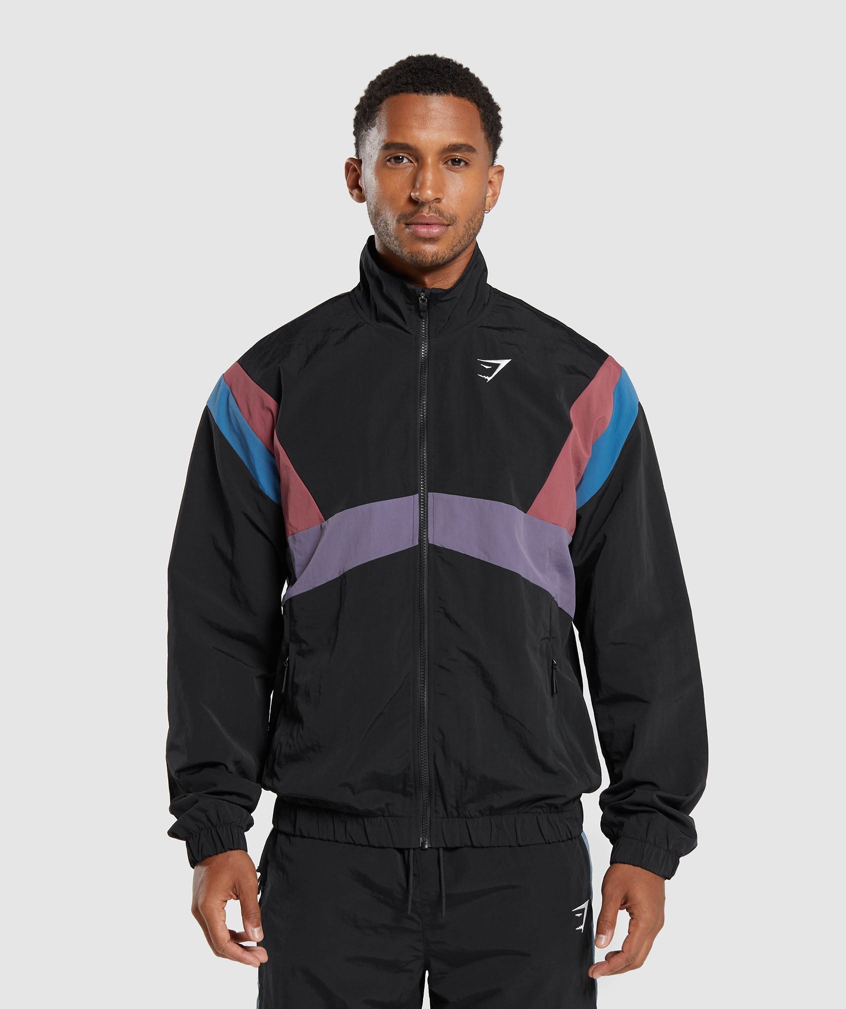 gymshark-retro-track-jacket-black-blue-purple-soft-berry-aw23