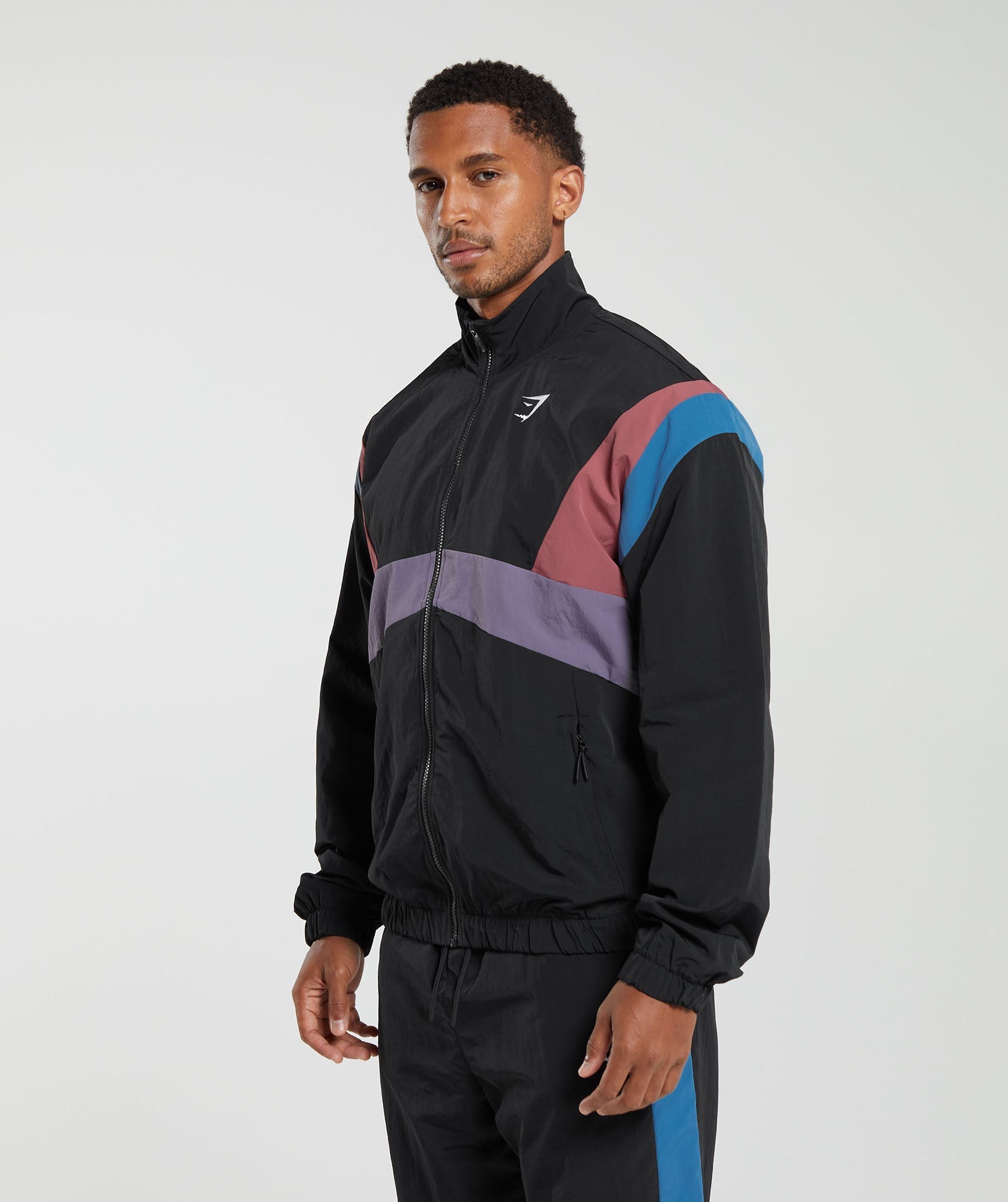 gymshark-retro-track-jacket-black-blue-purple-soft-berry-aw23