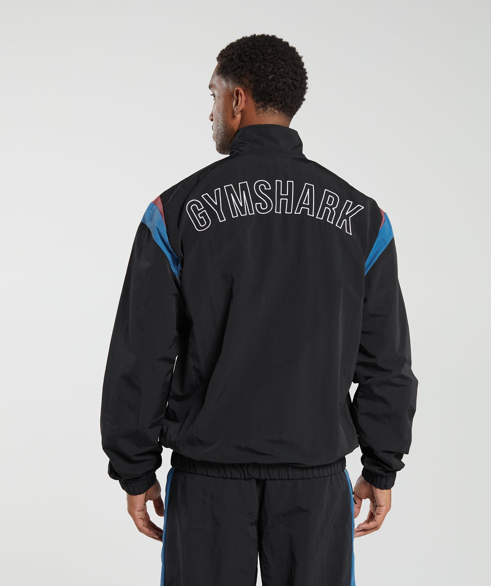gymshark-retro-track-jacket-black-blue-purple-soft-berry-aw23